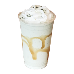 A matcha milkshake with caramel swirl and whipped cream