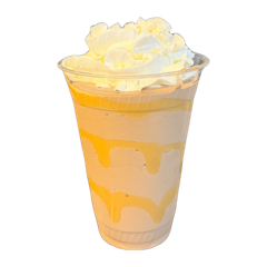 A milkshake with a peanut butter swirl and whipped cream